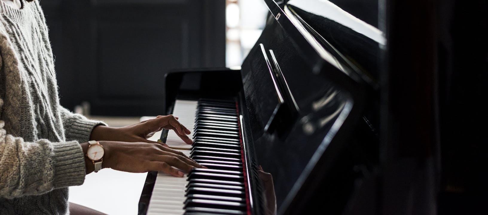 Piano player with watch