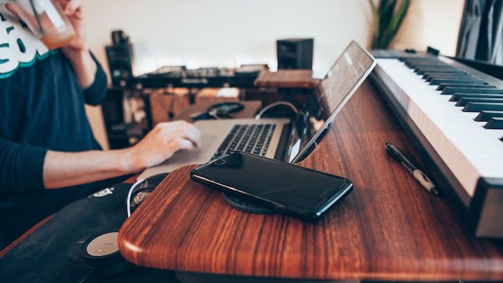 Notebooks in front of a keyboard