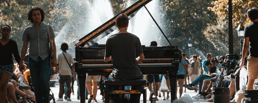 Man playing street piano