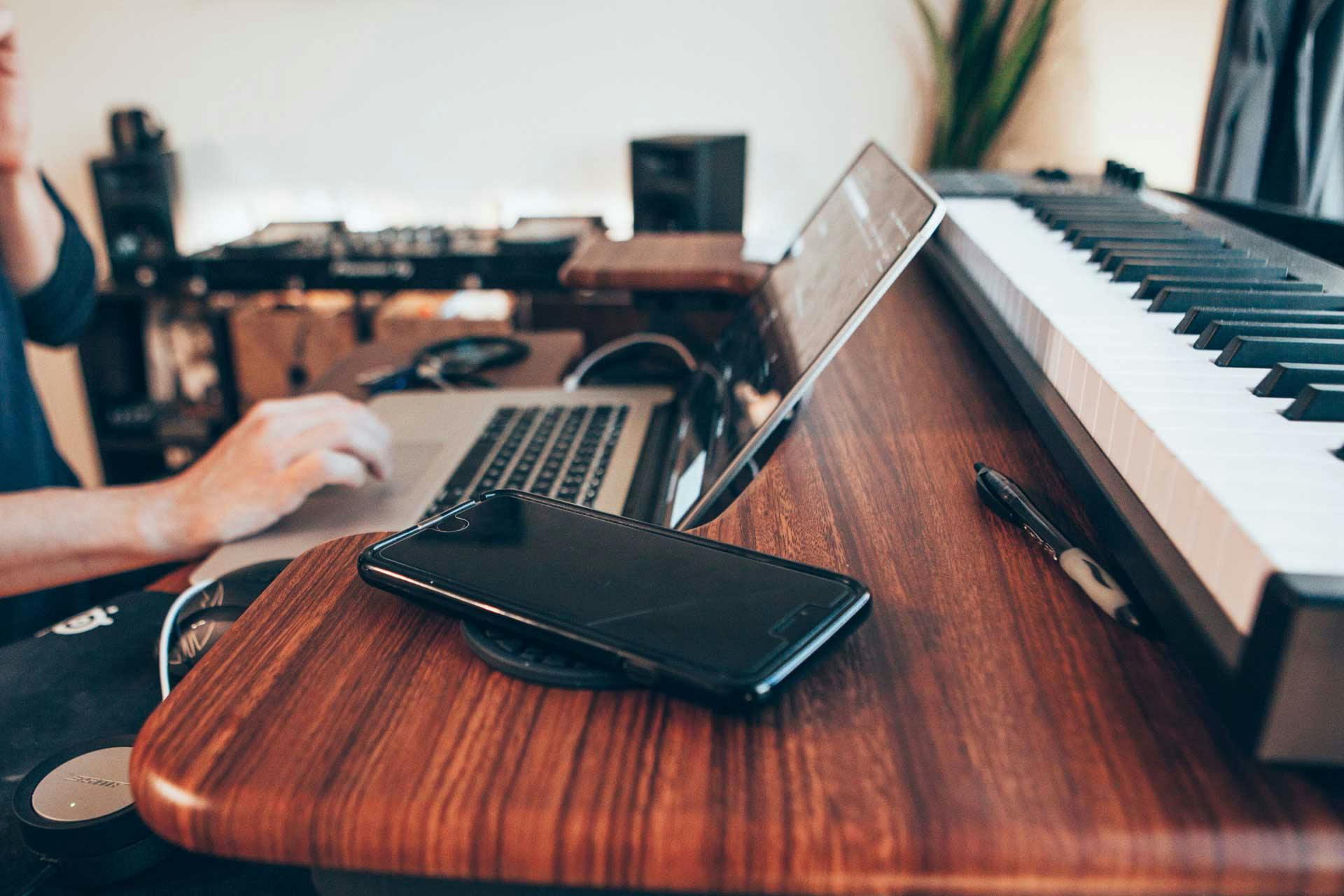 Notebook in front of a keyboar